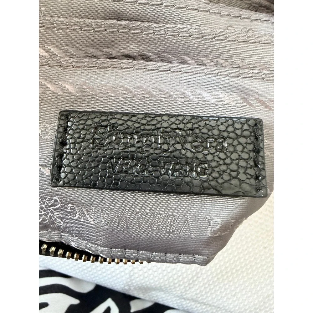 Vera Wang Wristlet Snake Skin Embosssex